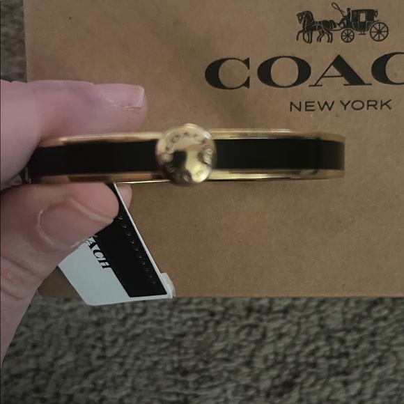 Coach Gold-Tone Bangle Bracelet - Picture 2 of 6